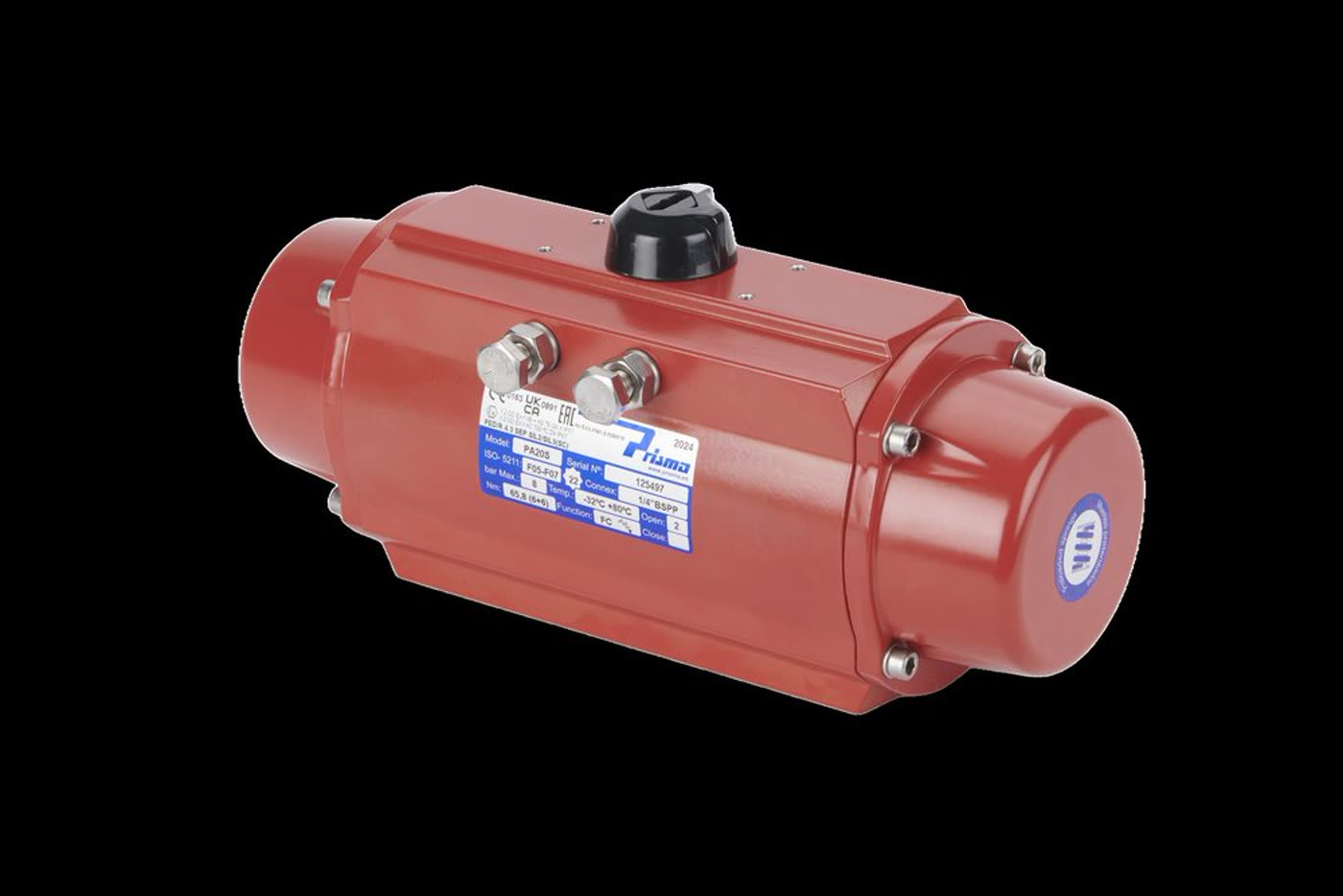 A pneumatic valve actuator photographed against black, its rating plate legible